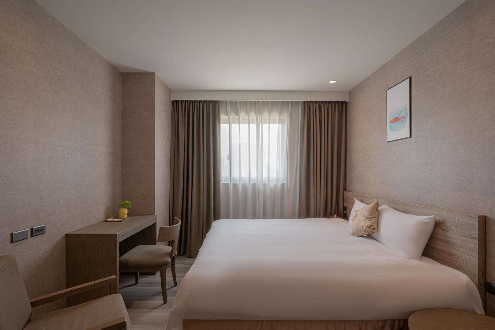 In Joy Hotel Тайчжун Экстерьер фото